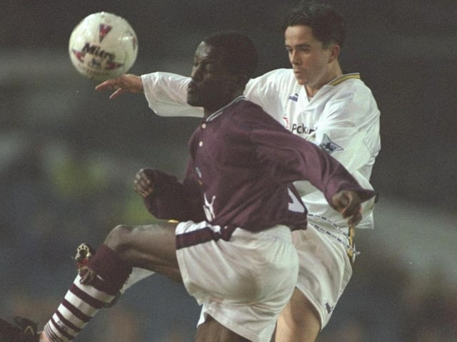 Gary Kelly challenges Derby County's Chris Powell during the Premier League clash at Elland Road in January 1997. The game ended goalless.
