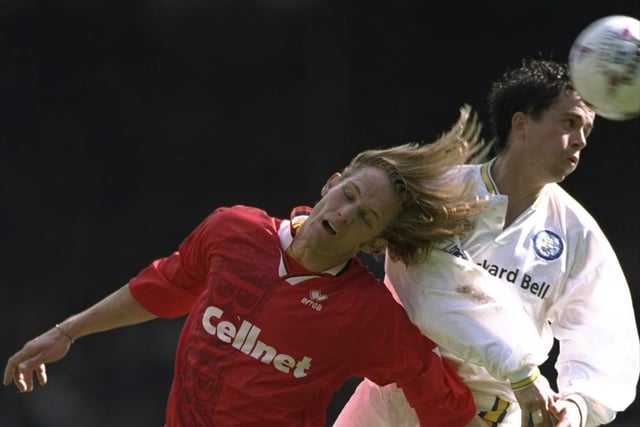 Gary Kelly rises high to clear the ball under pressure from Middlesbrough striker Mikkel Beck during the Premier League clash at Elland Road in May 1997. The game finished 1-1.