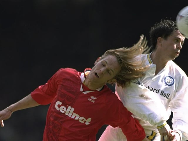 Gary Kelly rises high to clear the ball under pressure from Middlesbrough striker Mikkel Beck during the Premier League clash at Elland Road in May 1997. The game finished 1-1.