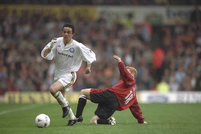 Gary Kelly gets the better of Manchester United midfielder Paul Scholes during the Premier League clash at Elland Road in September 1997. Leeds won 1-0.