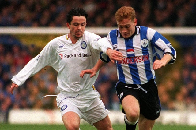 Gary Kelly in a duel with Sheffield Wednesday striker Mark Pembridge during the Premier League clash at Elland Road in January 1998. The Whites lost 2-1.