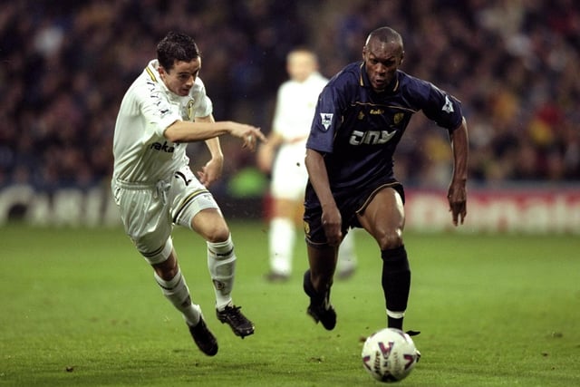 Gary Kelly chases down Wimbledon striker Marcus Gayle during the Premiership clash at Selhurst Park in November 1999. The Dons won 2-0.
