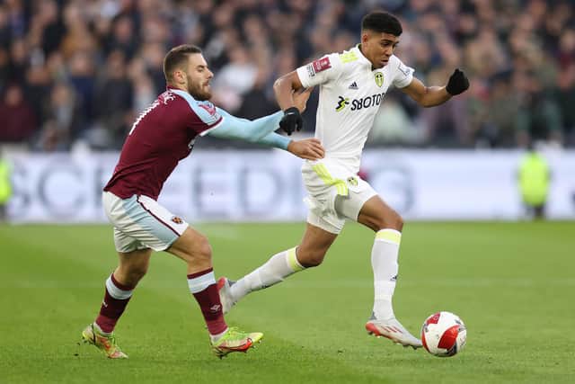 Cody Drameh holds of Nikola Vlašić during Leeds United's 2-0 FA Cup defeat to West Ham United. Pic: Alex Pantling