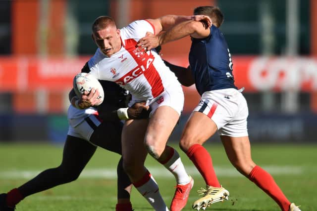 Leeds Rhinos' Mikolaj Oledzki on the charge for England against France in October. The 2025 World Cup will be held in France. Picture: Will Palmer/SWpix.com.