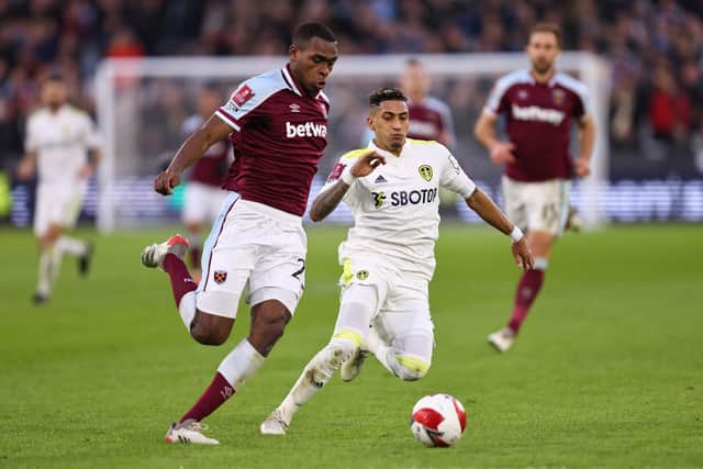 Raphinha holds off Issa Diop during Leeds United's 2-0 FA Cup defeat to West Ham United. Pic: Marc Atkins.