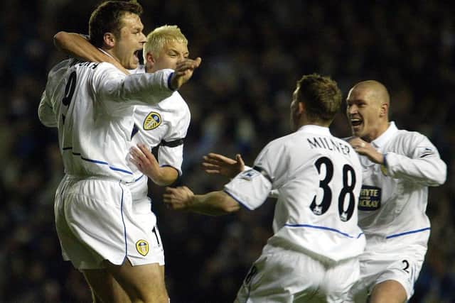 Mark Viduka celebrates doubling Leeds United's lead during the Whites' 3-2 Premiership win over Leicester City. Pic: Gareth Copley.
