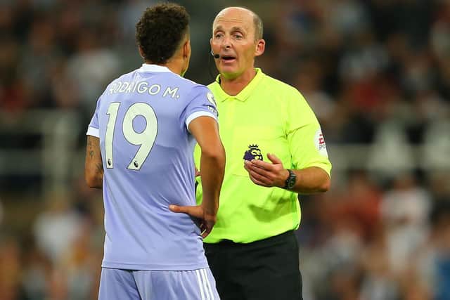 Rodrigo goes into Mike Dean's book during Leeds United's 1-1 draw with Newcastle United at St James' Park in September. Pic: MB Media.