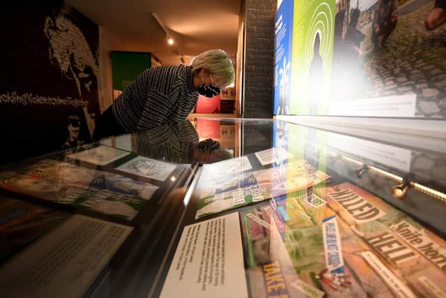 Anna Ward, museum interpretation manager at the Royal Armouries, looks at one of the displays in the At the Sharp End exhibition. Picture: Simon Hulme