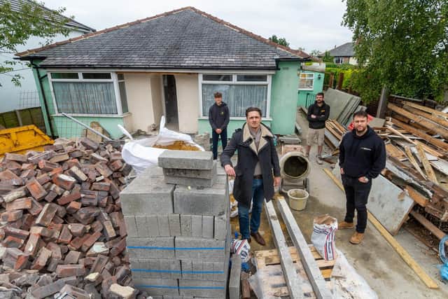 This is what the Netherfield Road bungalow looked like during construction. Pictured: (left to right) Dylan Graves, (Vie Investment Properties Limited), Alex Graves, (Vie Investment Properties Limited), James O'Sullivan, (HBD Group), and Joe Wade, (North Edge Installation Group).