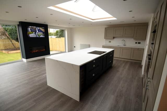 The kitchen is the hub of the home and has had thousands of pounds spent on making it as high-quality as possible. Floor to ceiling glass looks out onto the garden.