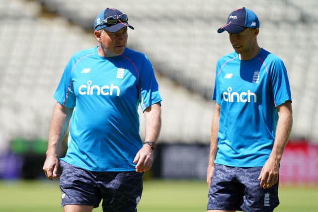 England's Joe Root (right) and Chris Silverwood. Picture: Martin Rickett/PA Wire.