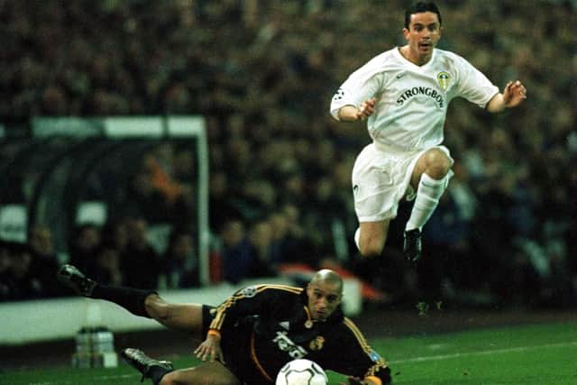 Gary Kelly jumps over Roberto Carlos of Real Madrid during the Champions League clash at Elland Road in November 2000. PIC: Getty