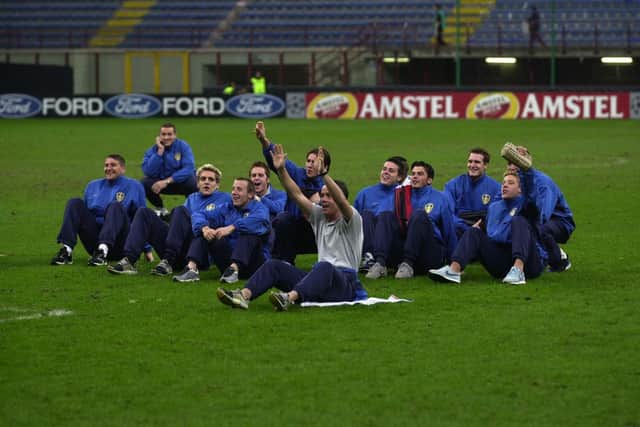 Gary Kelly leads the singing with the travelling faithful after Leeds United had drawn 1-1 with AC Milan at the San Siro in November 2000. PIC: Varley Picture Agency