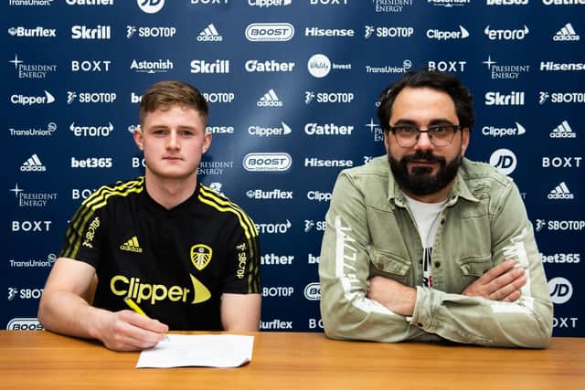 PRO DEAL: For 18-year-old Leeds United 'keeper Harry Christy, left, pictured alongside director of football Victor Orta. Picture by LUFC.