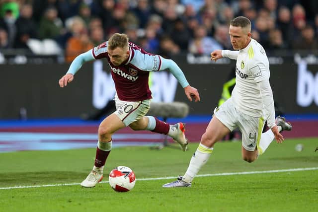 HANDFUL: West Ham's Jarrod Bowen, left, battles it out with Leeds United's Adam Forshaw during last weekend's FA Cup clash at the London Stadium. Photo by Craig Mercer/MB Media/Getty Images.