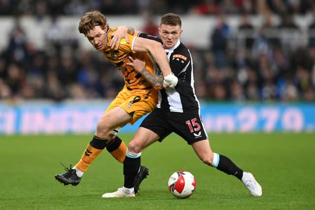 Newcastle United debutant holds off match-winner Joe Ironside during the Magpies' 1-0 FA Cup defeat to League One side Cambridge United. Pic: Stu Forster.