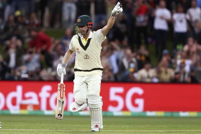 Century salute: Australia's Travis Head celebrates making 100 runs against England. Picture: AP Photo/Tertius Pickard