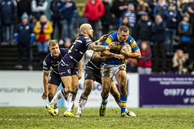 Cameron Smith, who suffered a bang to an eye, takes a carry for Rhinos against Rovers. Picture by Tony Johnson.
