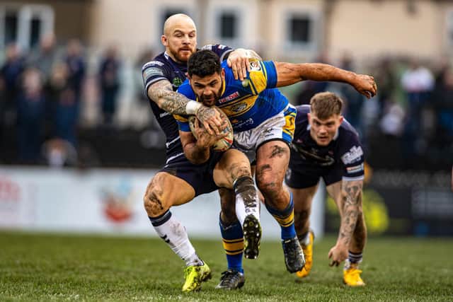 Rhyse Martin in acttion for Rhinos against Featherstone. Picture by Tony Johnson.