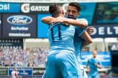 HISTORY: David Villa, back, hugs Jack Harrison as New York City defeat New York Red Bulls at the Yankee Stadium in New York City back in July 2016. Photo by Michael Stewart/Getty Images.