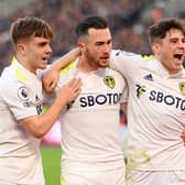 MAKE MINE A TREBLE: Jack Harrison, centre, celebrates completing his Leeds United hat-trick. Photo by Mike Hewitt/Getty Images.
