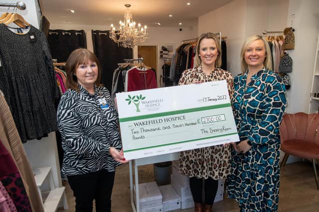 Katie and Karen hand over a cheque for £2,700 to Alison Wainwright from Wakefield Hospice (Photo: Bruce Rollinson)