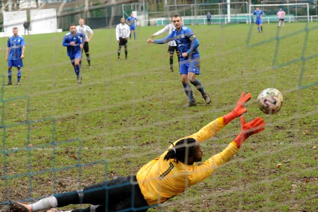 HT Sports goalscorer 
Lee Turner has his penalty saved by Fabio   Intumbo, of Chapeltown, during Sunday's Sanford Cup encounter. Picture: Steve Riding.