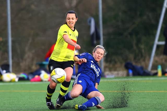 Leeds United defender Rebekah Bass goes in for a challenge during the Whites' 4-0 County Cup win over Harrogate Town. Pic: LUFC.