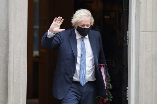 Boris Johnson is expected to announce an easing of England's coronavirus restrictions as he battles to save his premiership.
PA