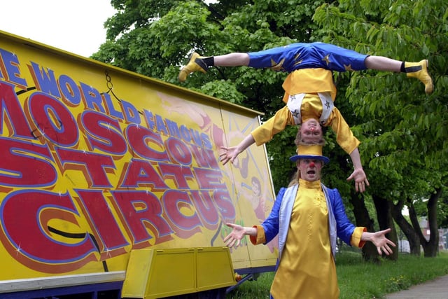 Father and son Andrei and Andrei Jnr  from The Moscow State Circus perform balancing acts on Woodhouse Moor in May 2001.