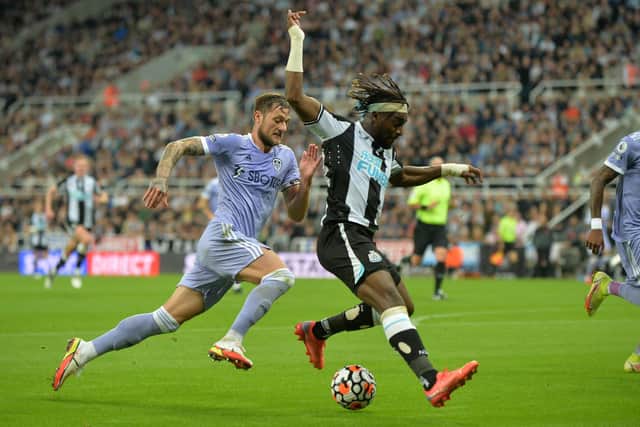 Allan Saint Maximin and Liam Cooper pursue the ball during Leeds United's 1-1 draw with Newcastle in September 2021. Pic: Bruce Rollinson.