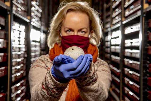 Clare Brown, curator of natural sciences with, an Adelie penguin egg from one of Shackleton's famed expeditions to Antarctica (Photo: Tony Johnson)