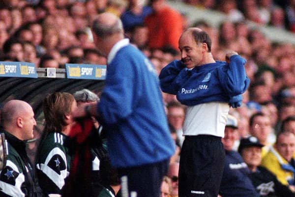 TOON BLUES: Referee David Elleray puts on a Leeds United training top to avoid his black shirt clashing with Newcastle United's dark strip during the Premier League clash at Elland Road of October 1997. Picture by Varleys.