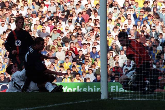 OPENER: Bruno Ribeiro slides Leeds United in front against Newcastle United back in October 1997. Picture by Varleys.