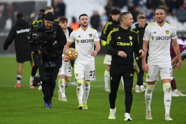 CAPITAL GAINS: Hat-trick hero Jack Harrison, centre, walks off with the match ball after his fine Leeds United treble in last weekend's 3-2 victory against West Ham at the London Stadium. Photo by Mike Hewitt/Getty Images.