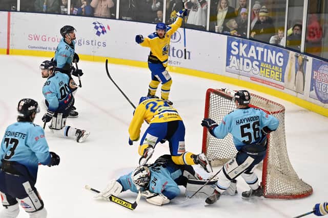 Leeds Knights' Matty Davies, top, starts to celebrate after Cole Shudra scores a late, late winner against Sheffield Steeldogs on Friday night. Picture: Bruce Rollinson