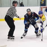 Former Hull Pirates team-mates Jason Hewitt and Matty Davies. right, battle for possession at Ice Sheffield. Picture: courtesy of Peter Best/Steeldogs media.