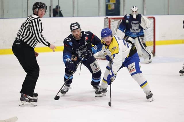 Former Hull Pirates team-mates Jason Hewitt and Matty Davies. right, battle for possession at Ice Sheffield. Picture: courtesy of Peter Best/Steeldogs media.