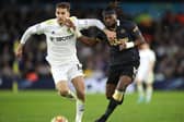 Diego Llorente and Allan Saint-Maximin tussle for possession during Leeds United's 1-0 defeat to Newcastle United at Elland Road. Pic: George Wood.