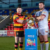 Dewsbury Ramsd' Matty Beharrell, left and James Brown of Batley Bulldogs with the Championship Shield. Picture by Allan McKenzie/SWpix.com/RFL.