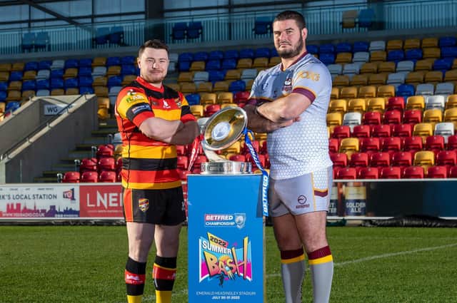Dewsbury Ramsd' Matty Beharrell, left and James Brown of Batley Bulldogs with the Championship Shield. Picture by Allan McKenzie/SWpix.com/RFL.
