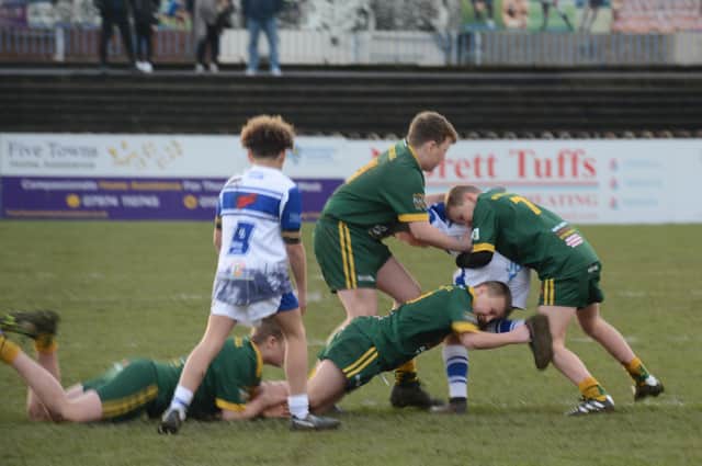 Tough tackling action from Lock Lane U12s' game against West Hull Raiders in the final of the BARLA Yorkshire Cup. Picture: Rob Hare