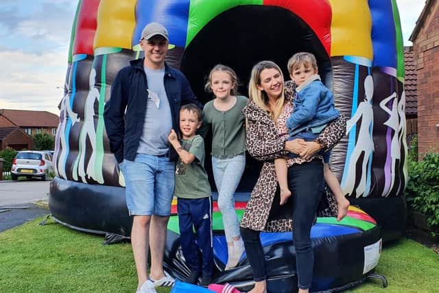 Archie Vaughan (right) with his family