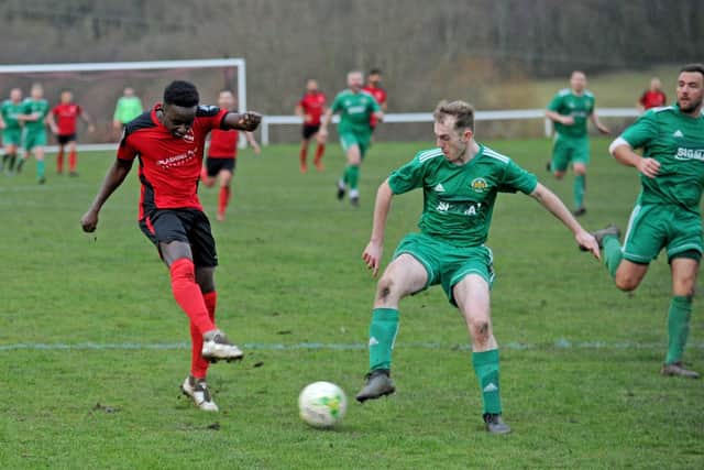 Abdou Bojang shoots for Horbury Town in the 1-1 draw with West Yorkshire League Premier Division title rivals Beeston St Anthony. Picture: Steve Riding.