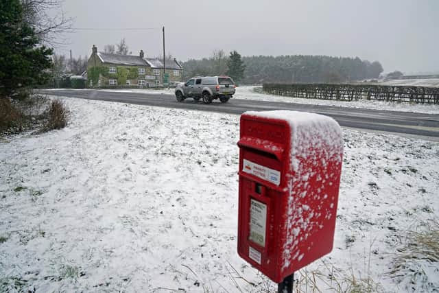 Library image of a Royal Mail post box. Royal Mail is set to axe around 700 management jobs as part of cost-cutting plans, the company has announced.