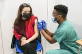 A woman receives her Covid vaccine at the Leeds Vaccination Centre in Elland Road (Photo: Danny Lawson/PA Wire)