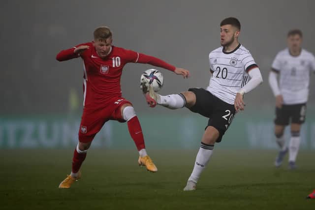 INJURY BLOW: For Leeds United's Mateusz Bogusz, left, pictured in action for Poland's under-21s against Germany in November. Photo by Christian Kaspar-Bartke/Getty Images.