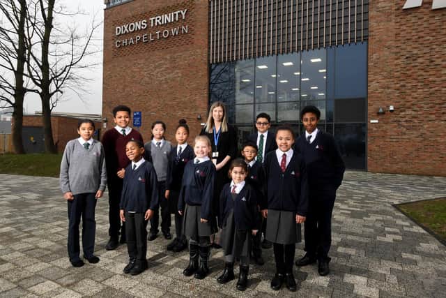 Dixons Trinity Academy, Chapeltown has achieved an Outstanding Ofsted report. Principal Natalie Brookshaw is pictured with some of the pupils outside the school.