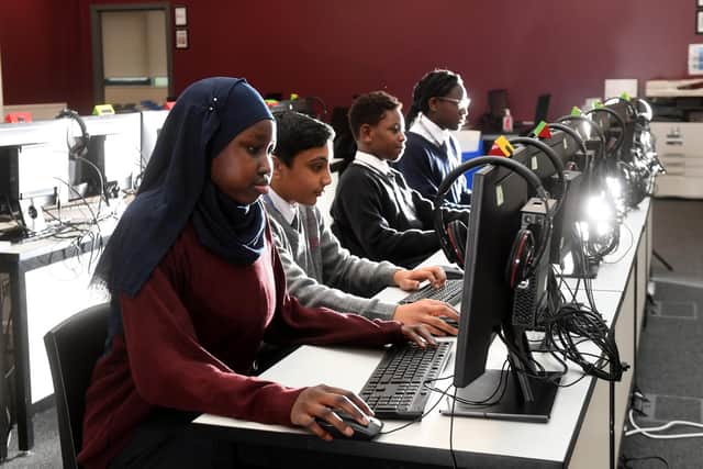 Pupils at work at Dixons Trinity Chapeltown. The school, which is not yet full, has landed an Outstanding grading from Ofsted at its first inspection.