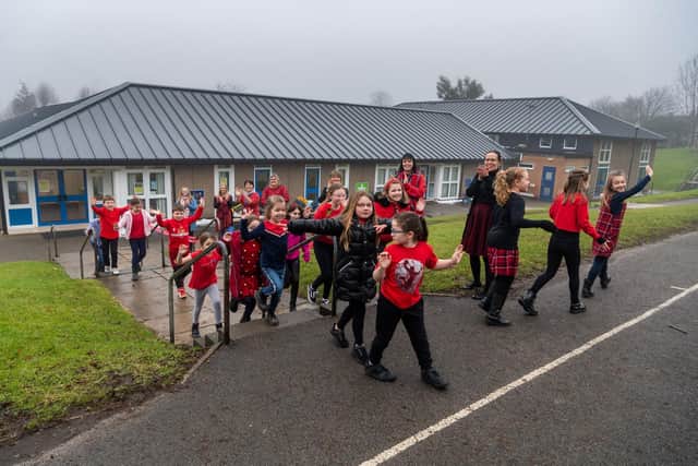 Key worker pupils at Kippax Greenfield Primary School took part in a sponsored step climb for Wear Red Day in 2021. Picture: James Hardisty